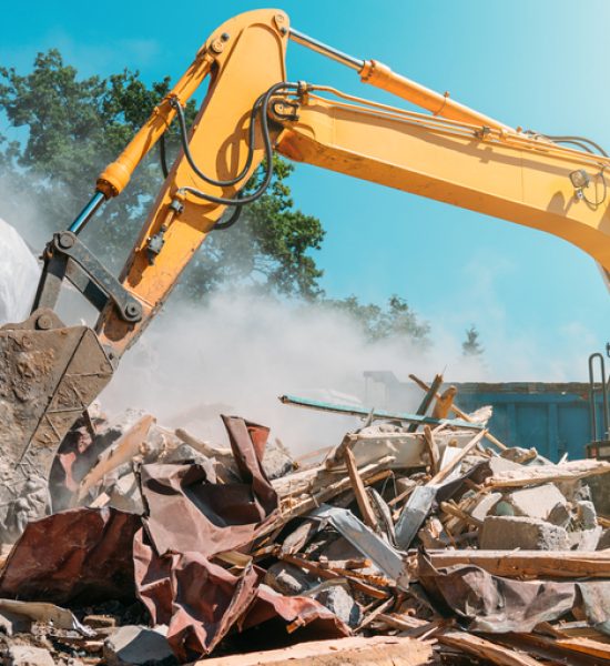 Demolition,Of,Building.,Excavator,Breaks,Old,House.,Freeing,Up,Space